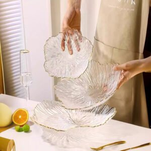 glass fruit plate is a household fruit plate on the coffee table in the living room